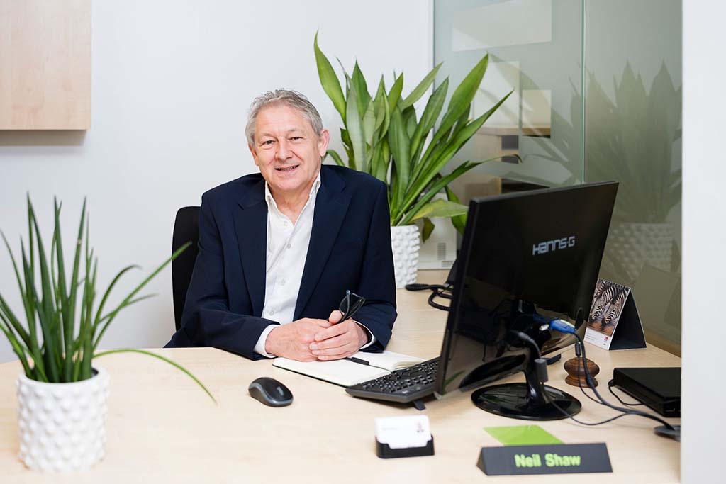 Chinneck Shaw - Our Story - 2 - Neil at desk